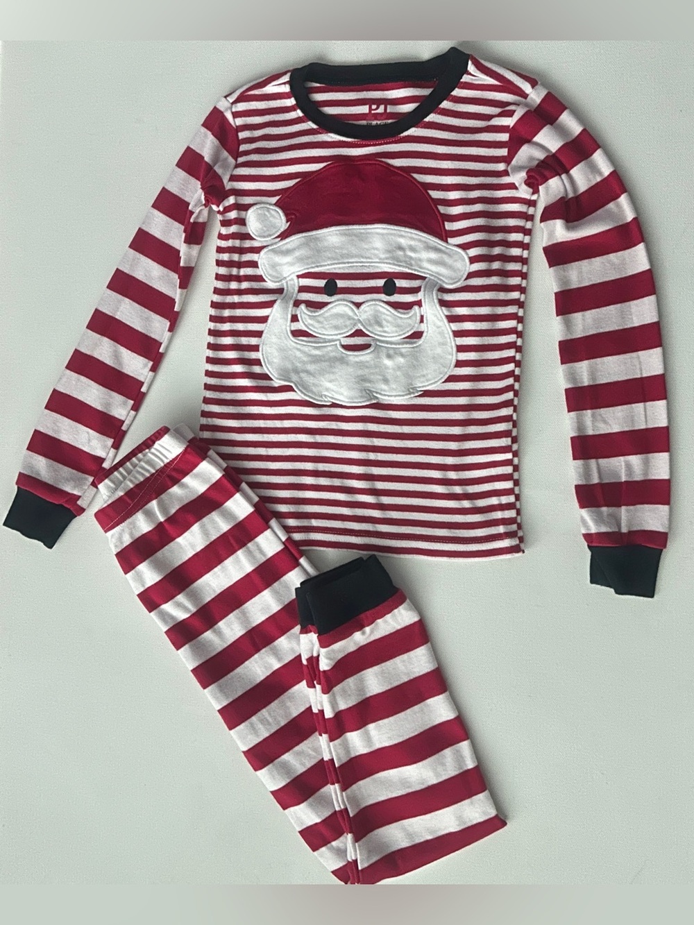 The Children’s Place girl’s.  Two piece holiday pajama set.  Size 4T.